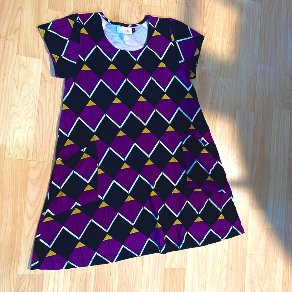 Purple fighting eel dress, size kids 10